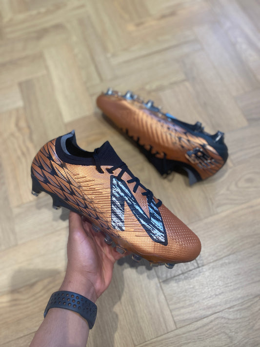 New Balance Tekela V4 Pro FG - Bronze / Black